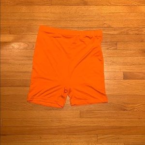 orange biker shorts